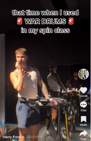 Spin class instructor using “War Drums” music during a session.